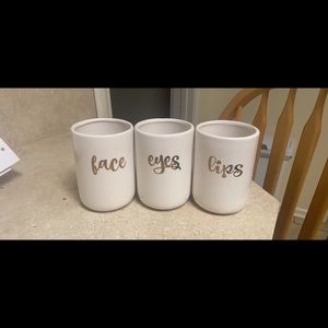 Makeup brush holders